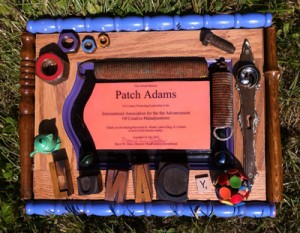 In 2012, at the Oregon Country Fair, a number of us with MindFreedom Oregon gave Patch Adams, MD this award, presented in the Community Village. Psychiatric survivor Chrissy Piersol did the honors of presenting. Award was created from recycled objects like loose screws and nuts, by psychiatric survivor artist Tim Boyden. 